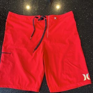 Men’s Hurley Phantom board shorts, worn once. 10” inseam. Red. Great condition.